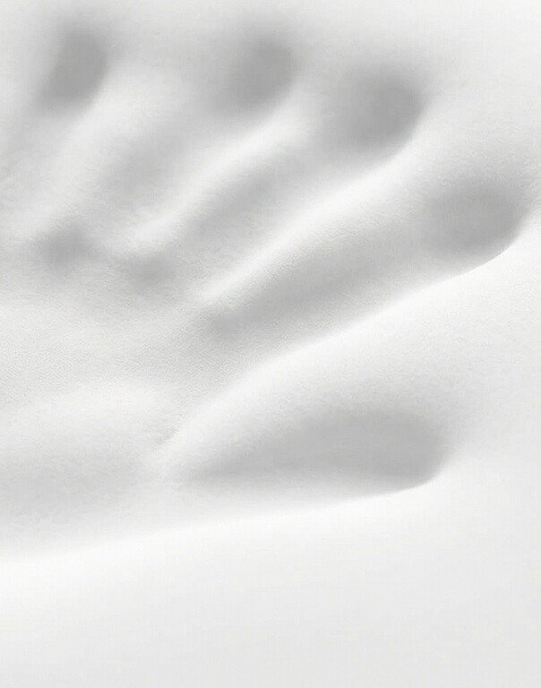 Medical-grade Adaptive Memory Foam of The New Derila for perfect cervical spine alignment.